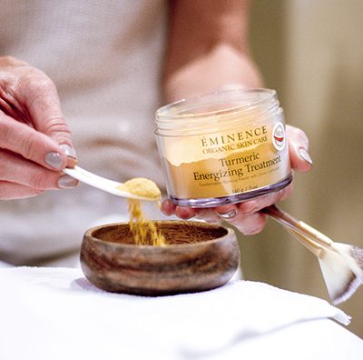 Eminence turmeric product being prepared for a custom facial